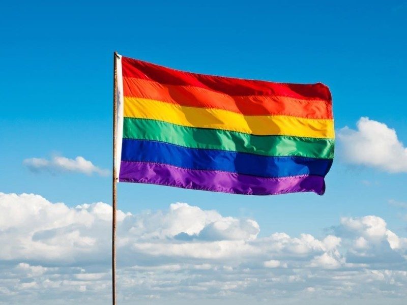 shu_135092909_LGBTFlagSkyClouds.jpg